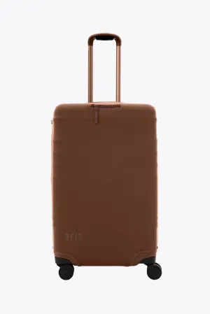 The Medium Check-In Luggage Cover in Maple