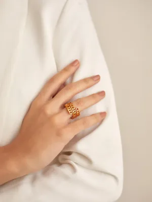 The O.H Monogram Spin Ring