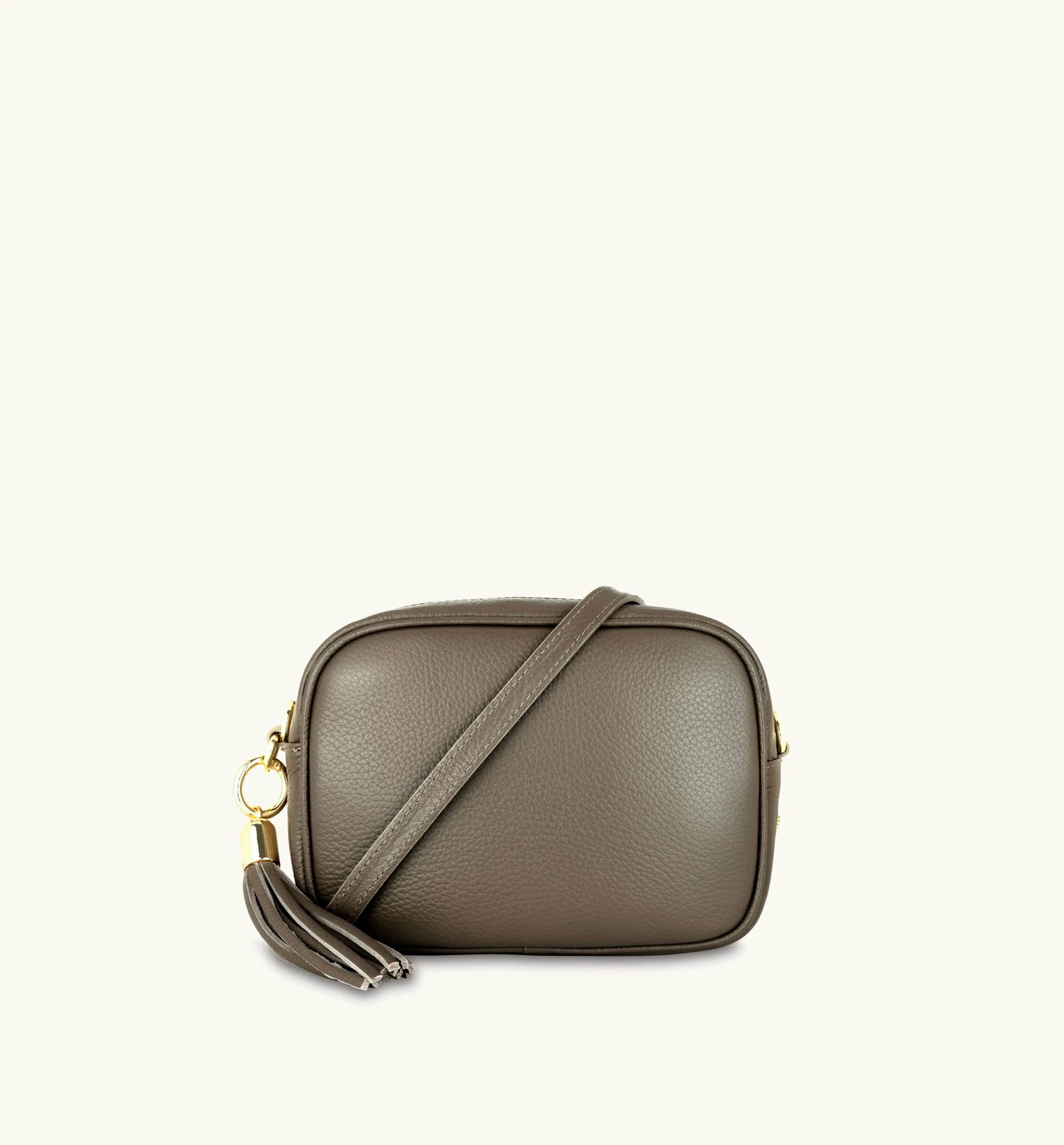 The Tassel Latte Leather Crossbody Bag With Gold Chain Strap